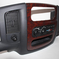 2002-2005 Dodge Ram Dash Radio Climate Control Bezel 5GT17TRMAA - BIGGSMOTORING.COM