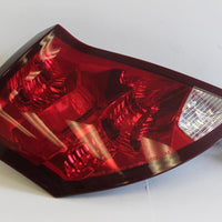 2003-2007 SATURN ION DRIVER SIDE REAR TAIL LIGHT - BIGGSMOTORING.COM