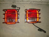 87-06 JEEP WRANGLER TAILLIGHTS W/ GUARD FREE CHROME GAS