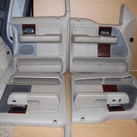 04-08 FORD F150 LARIAT CREW CAB DOOR PANELS SET W/ SWITCHES PANEL PARCHMNET TAN - BIGGSMOTORING.COM